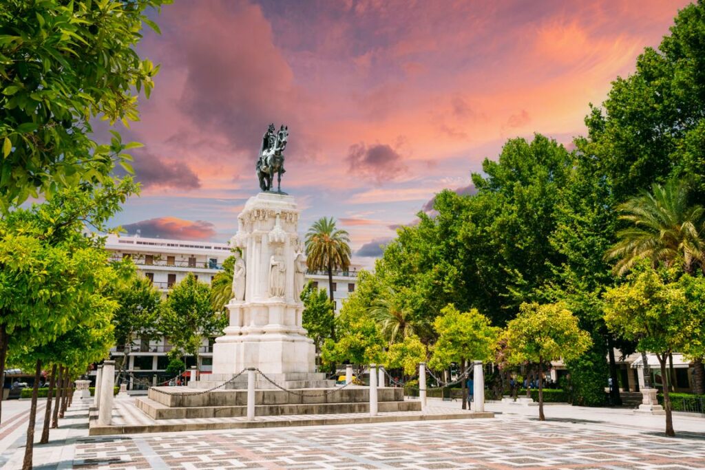 Marbella, Seville, Spain. Monument to King Saint Ferdinand at New Square Plaza Nueva in Seville, Spain. Altered Sunset Sunrise Sky